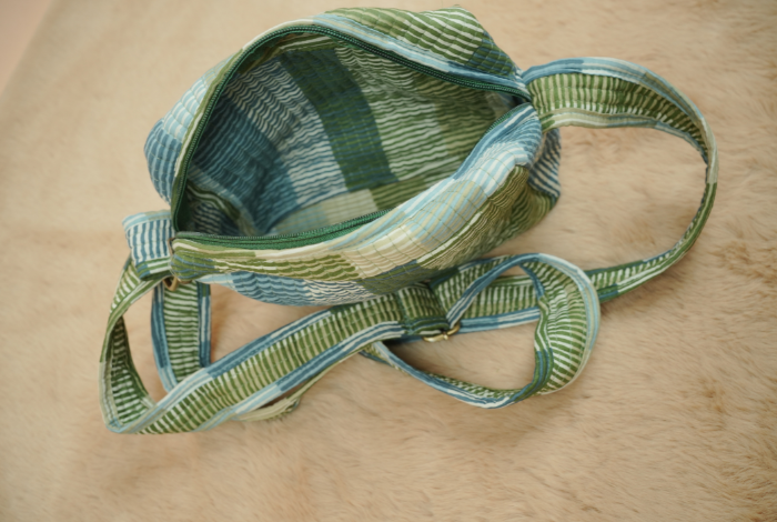 Multi-Tonal Striped Quilted Sling Bag with Wide Shoulder Strap