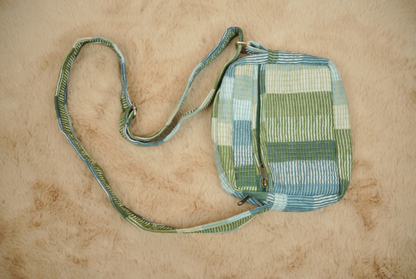 Multi-Tonal Striped Quilted Sling Bag with Wide Shoulder Strap